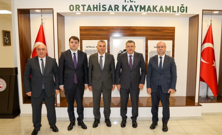 BAŞKAN GENÇ’TEN ORTAHİSAR KAYMAKAMI KOTAN’A HAYIRLI OLSUN ZİYARETİ