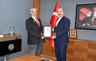 Başkan Tezcan, Artuklu Kaymakamı Öztabak'ı...