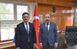 Başkan Dr.Hisoğlu Bölge müdürü Yılmaz’ı...