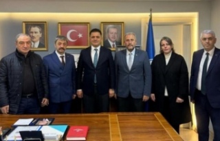 Kamu senden Başkan Dr Hisoğlunu ziyaret.