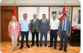 Başkan Durmuş, Başkan Genç’i Ziyaret Etti