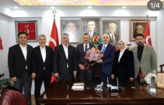 Ak Parti’den MHP’yi ziyaret.