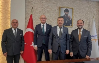 MHP’den Ortahisar Tapu Sicil Müdürü Sağlam’a Ziyaret