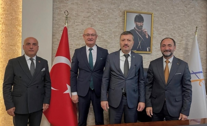 MHP’den Ortahisar Tapu Sicil Müdürü Sağlam’a Ziyaret