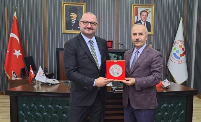 Rektör prof.Dr.Hacı Müftüoğlu Rektör prof.Dr. Kutlu‘yu ziyaret etti.